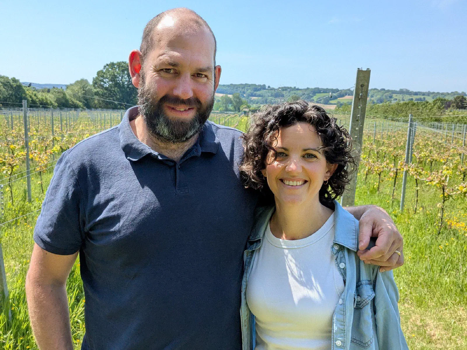 Alastair and Alex, your hosts, standing in a vineyard